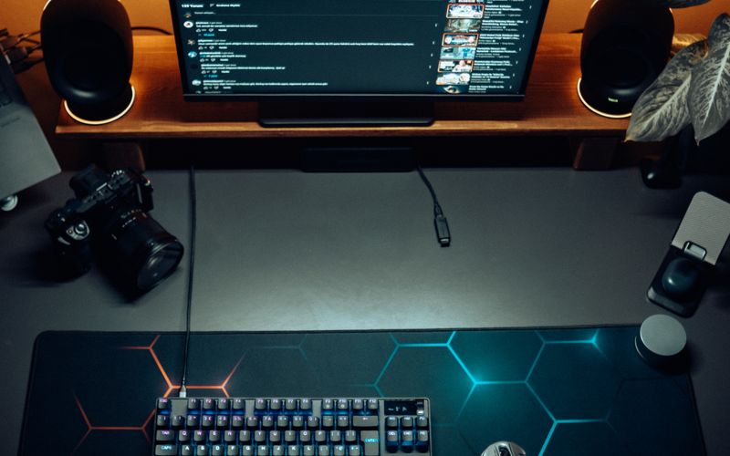 Modern gaming setup with RGB lighting, keyboard, and gaming laptop — best gaming laptops in Uganda