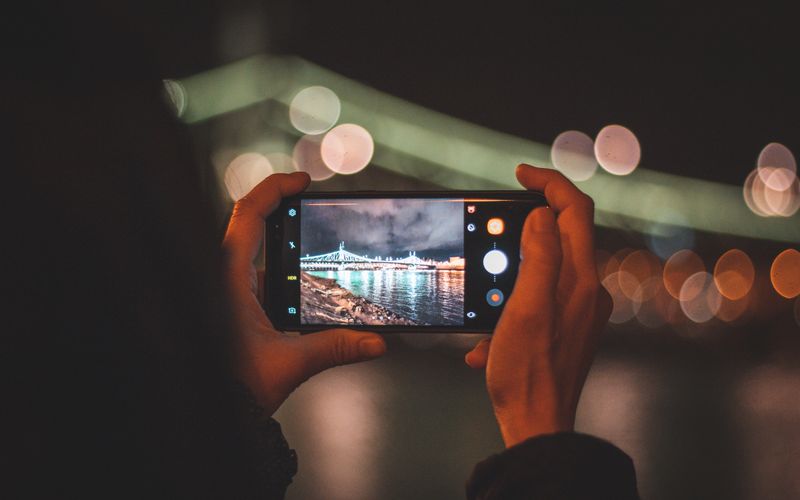Smartphone camera photography close-up showcasing phone lens and photographic capabilities